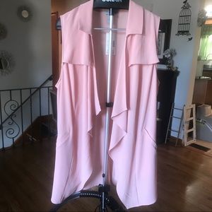 Catherine’s long vest